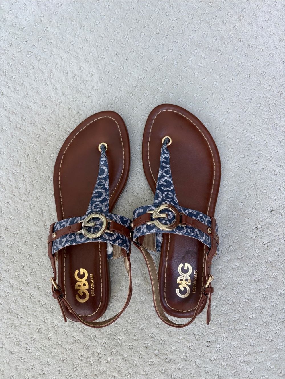 GBG Los Angeles Brown Leather Sandals with Blue Monogram Straps. No scuff marks